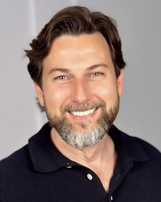 Portrait of Jarek Pencko, founder of Partners In Design